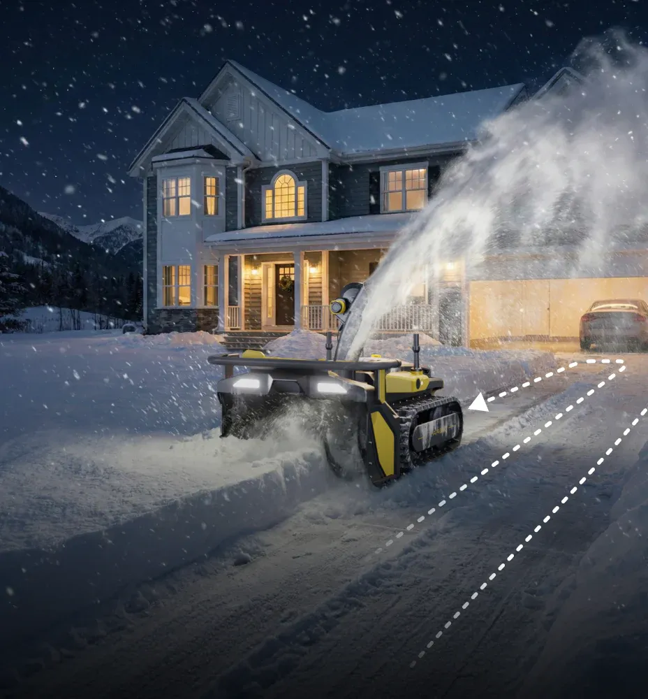 The robot clearing a driveway at night with a dashed line showing its planned route